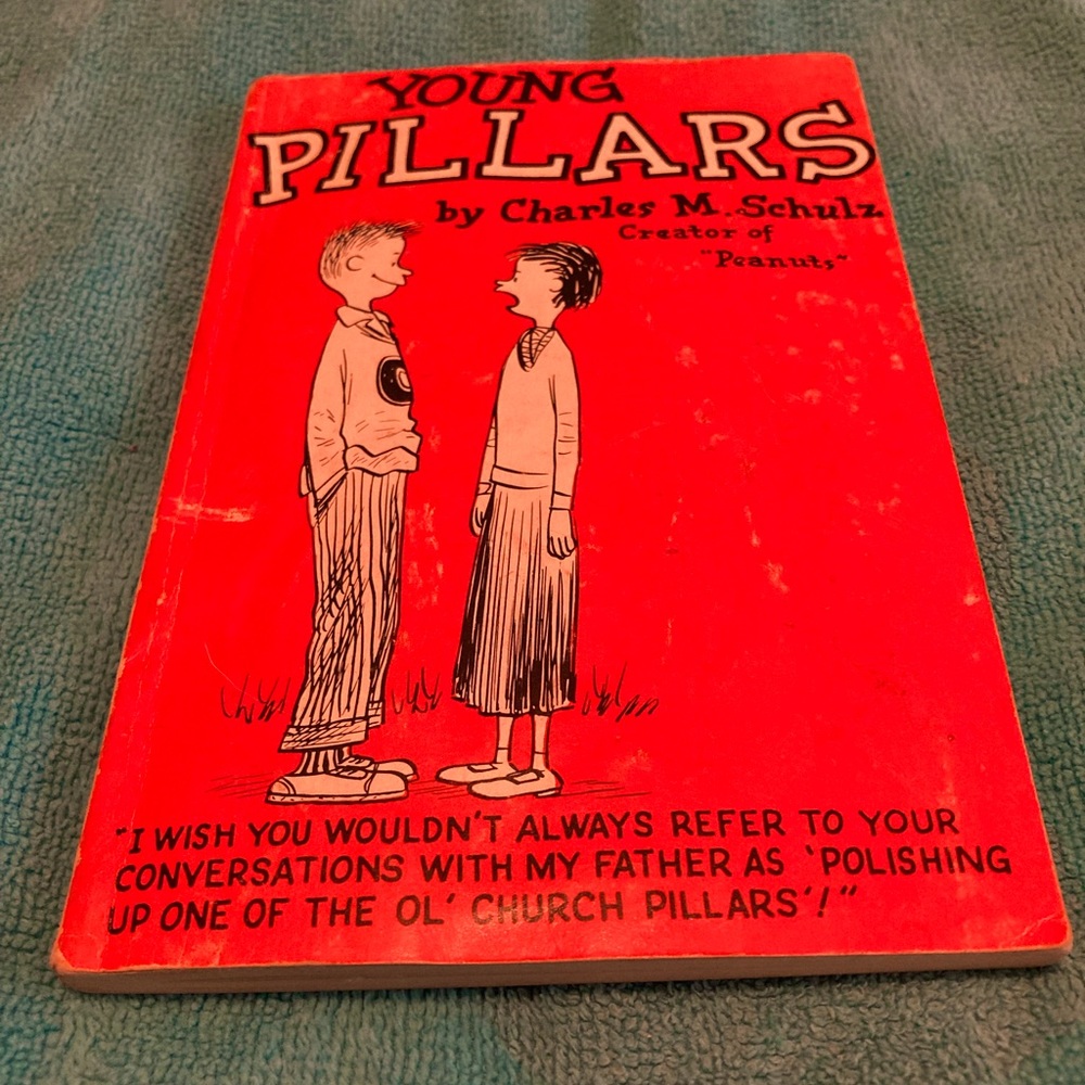 Book. Young Pillars. Charles M. Schulz. Creator of Peanuts.”
